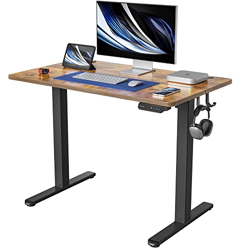 FEZIBO Height Adjustable Electric Standing Desk, 100 * 60cm Stand up Table, Sit Stand Home Office Desk with Splice Board, Black Frame/Rustic Brown Top